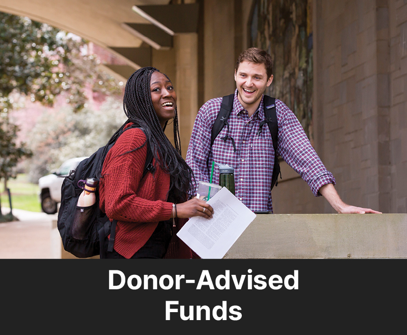 Two students smiling. Links to Donor-Advised Funds