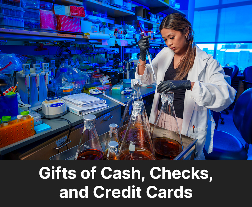 A student experimenting. Links to Gifts of Cash, Check, and Credit Cards